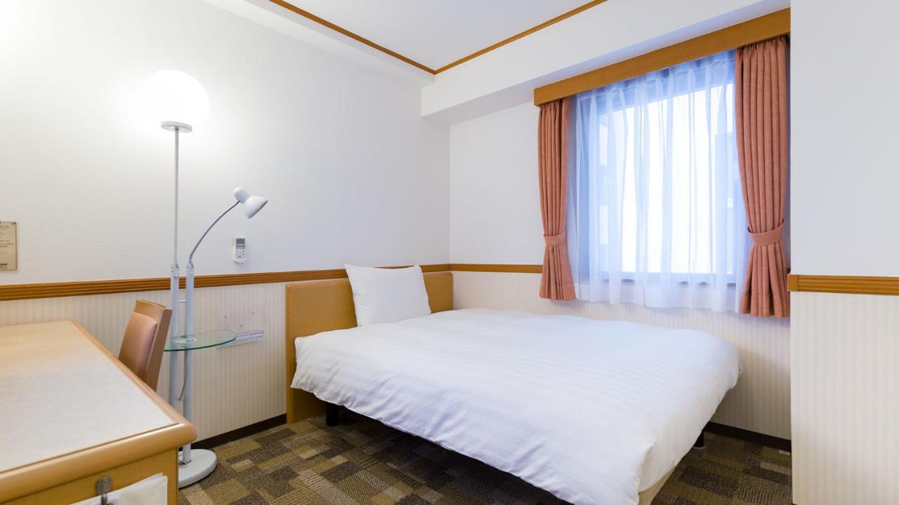 Toyoko Inn Nishitetsu Kurume Eki Higashi Guchi Buitenkant foto