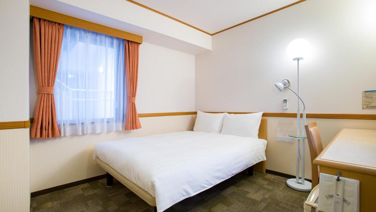 Toyoko Inn Nishitetsu Kurume Eki Higashi Guchi Buitenkant foto